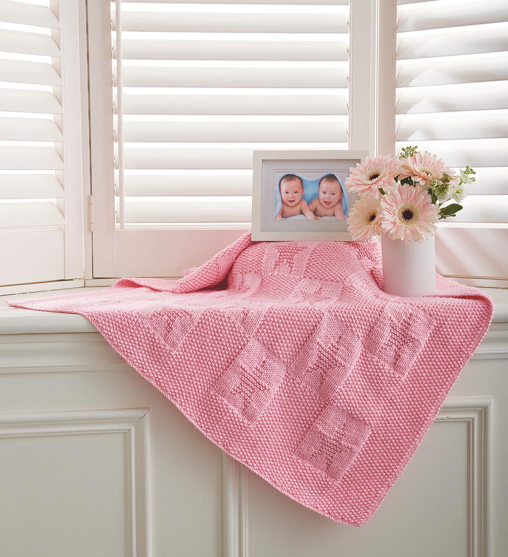 Pink knit baby online blanket