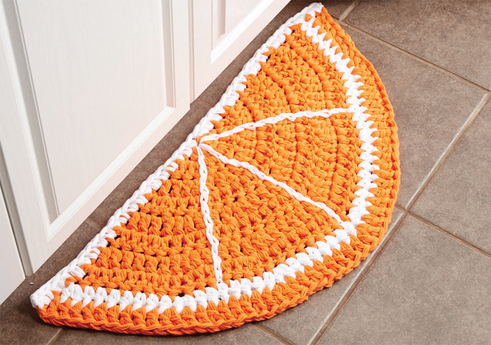 Patrón de alfombra de crochet con rodajas de cítricos gratis